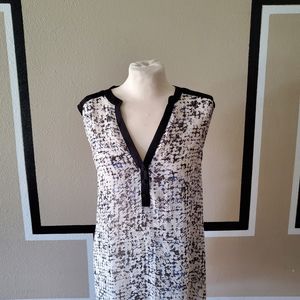 Sheer sleeveless high-low blouse